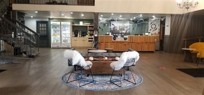 Hotel lobby with chairs covered in blankets